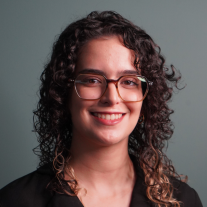 Professional headshot of Juliana Rubinatto Serrano, Graduate Program Coordinator