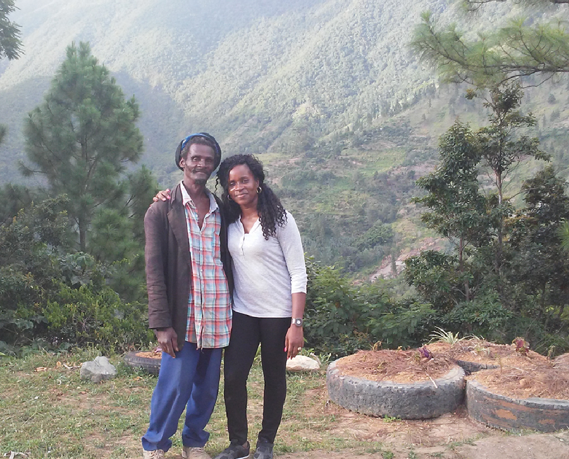 Samuels-Jones with one of the farmers in the Blue Mountains, Jamaica (PHOTO: Tameka Samuels-Jones)