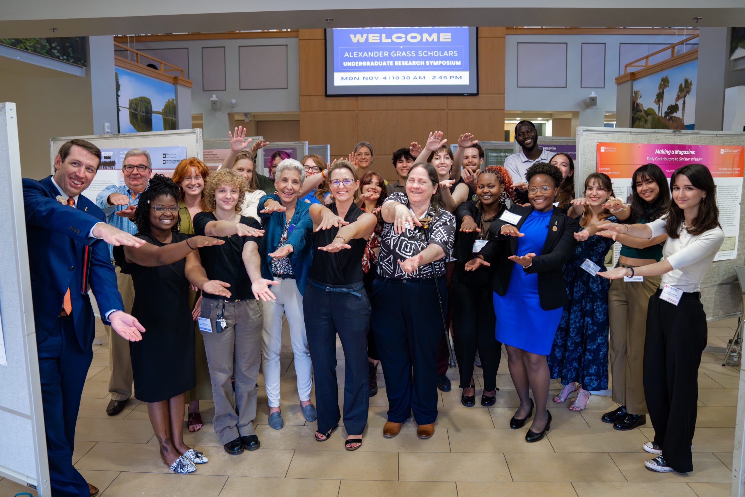 group of people doing the gator chomp